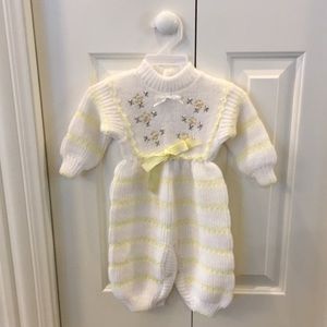 Newborn sweater suit with pearls.